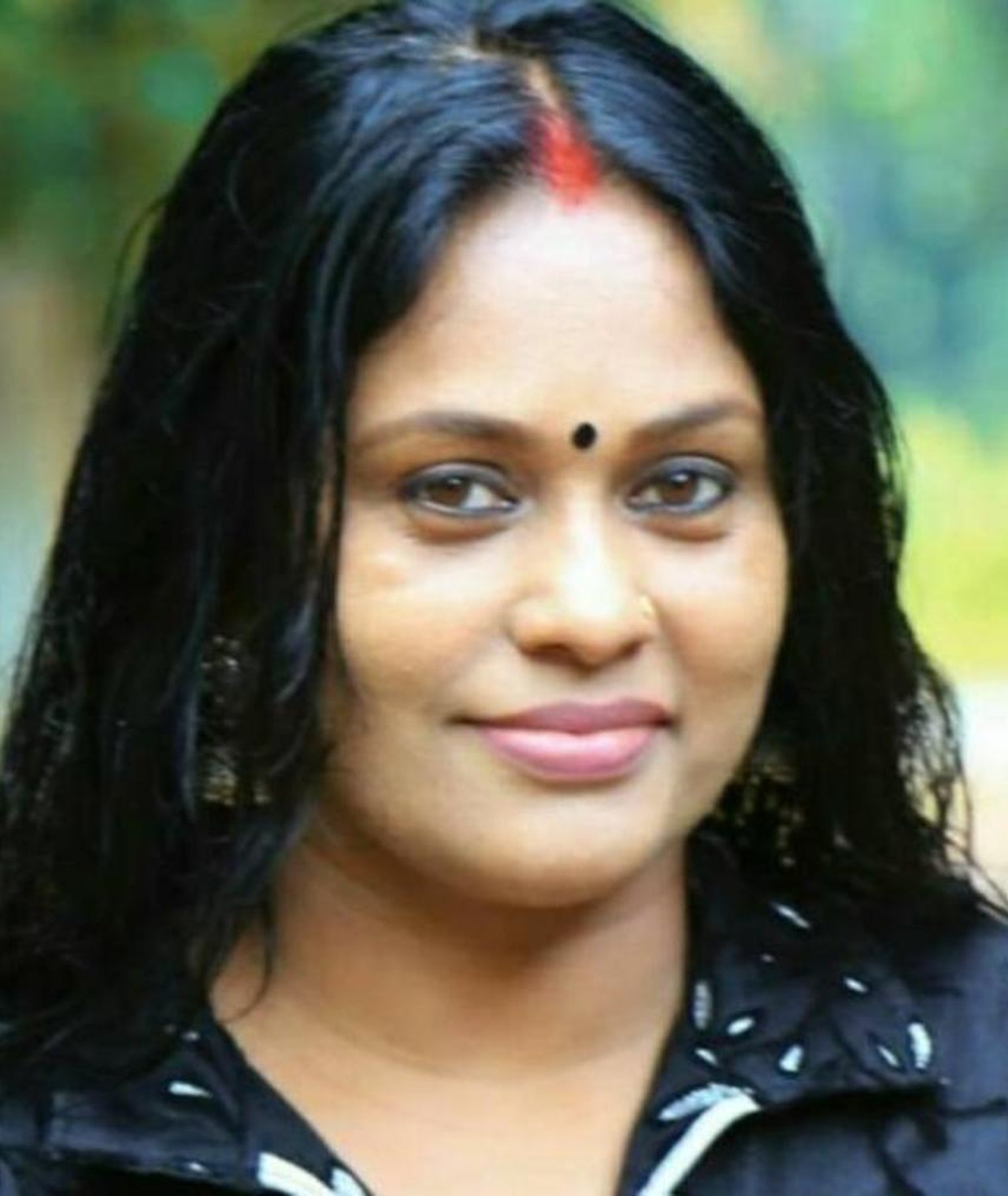 Photo of Seema G. Nair