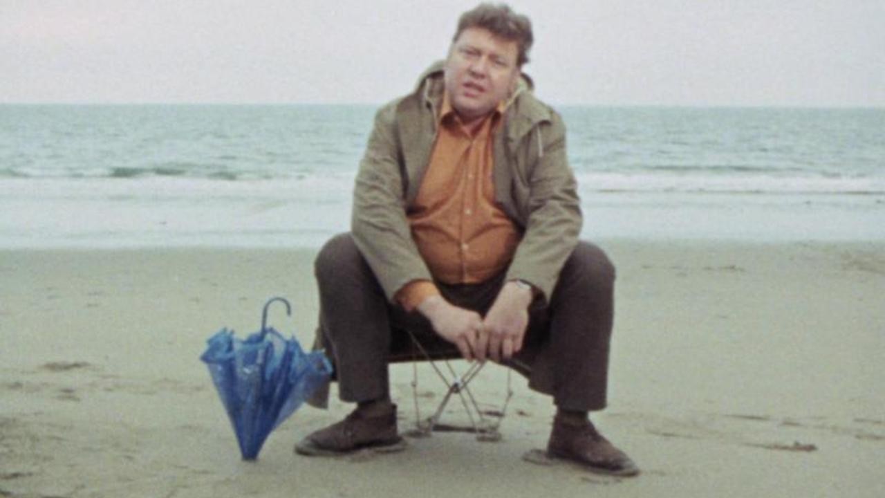 Fat Man on a Beach
