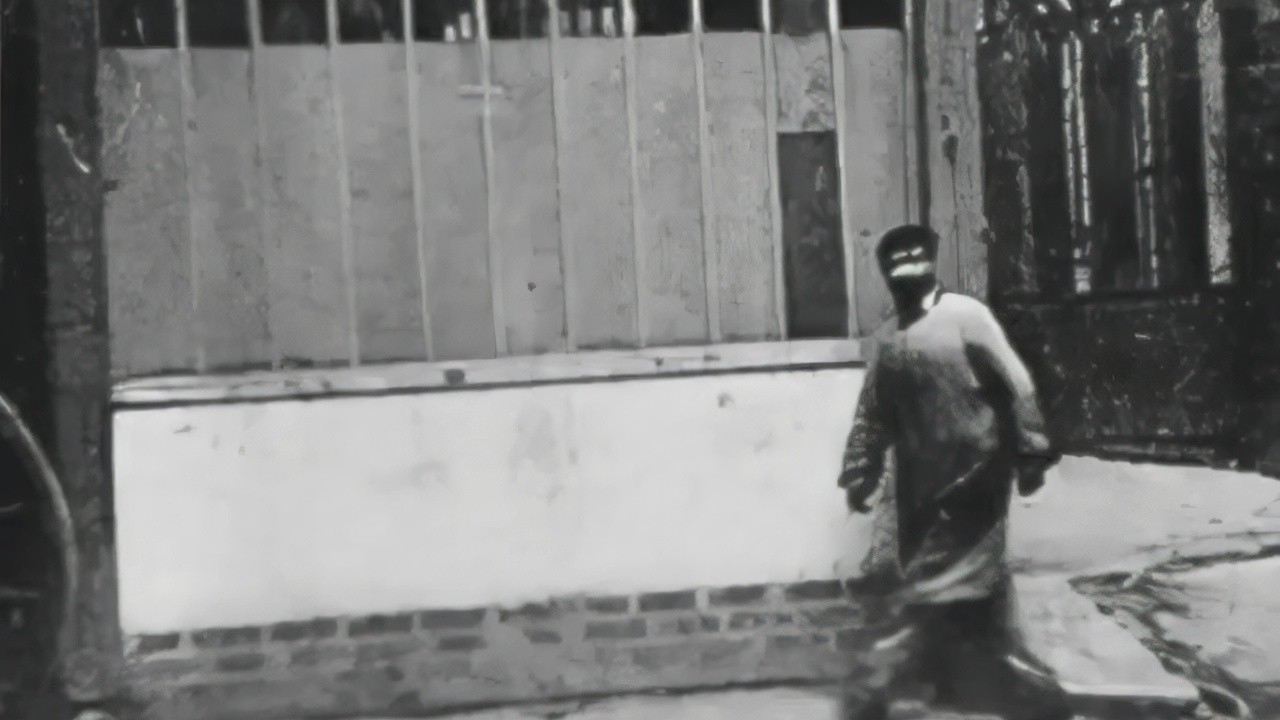 Man Walking Around the Corner