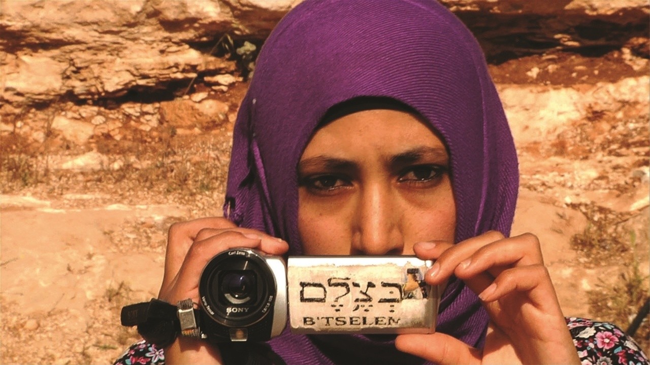 In the image: Palestinian women capture the occupation