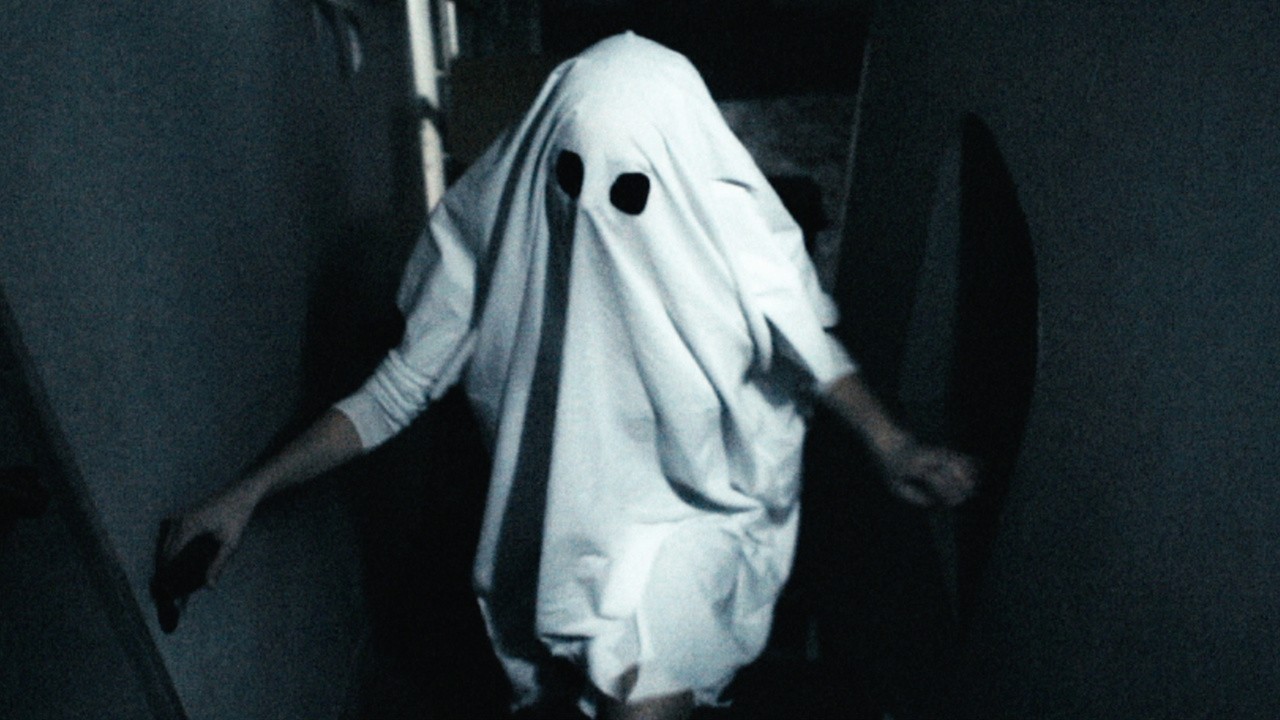 A Ghost and the Boy With a Box on His Head