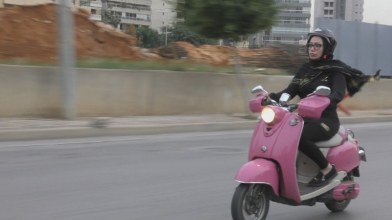 Zeinab on the Scooter