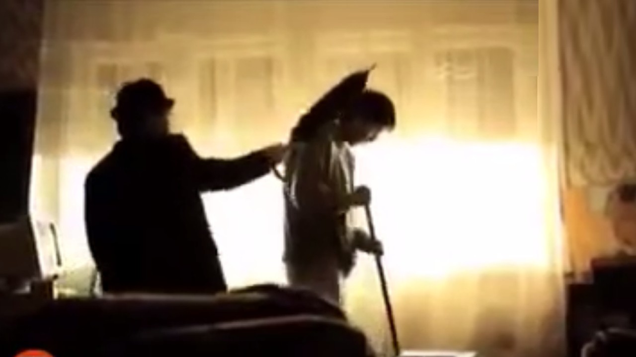 The Man in the Habit of Hitting Me on the Head with an Umbrella